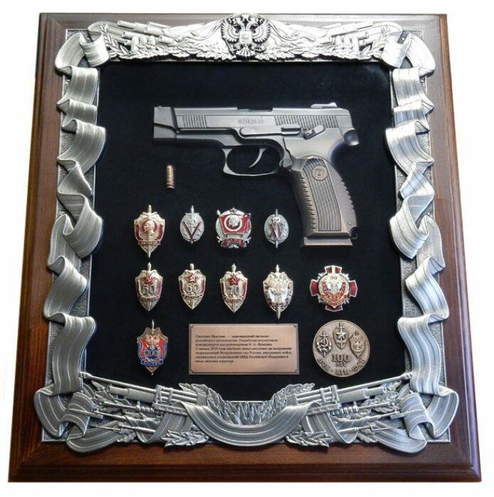 Panel "With Yarygin's pistol and FSB badges"