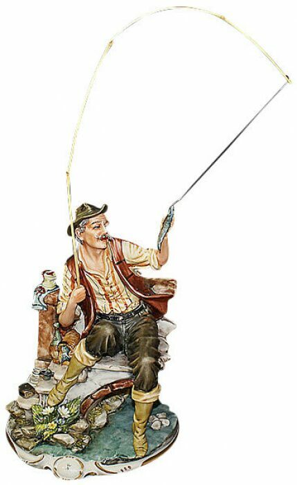 The statuette "The Fisherman on the bridge"