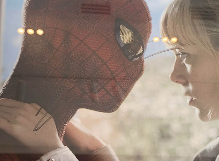 A photo from the movie "Spider-Man" with 2 autographs by actors Emma Stone and Andrew Garfield