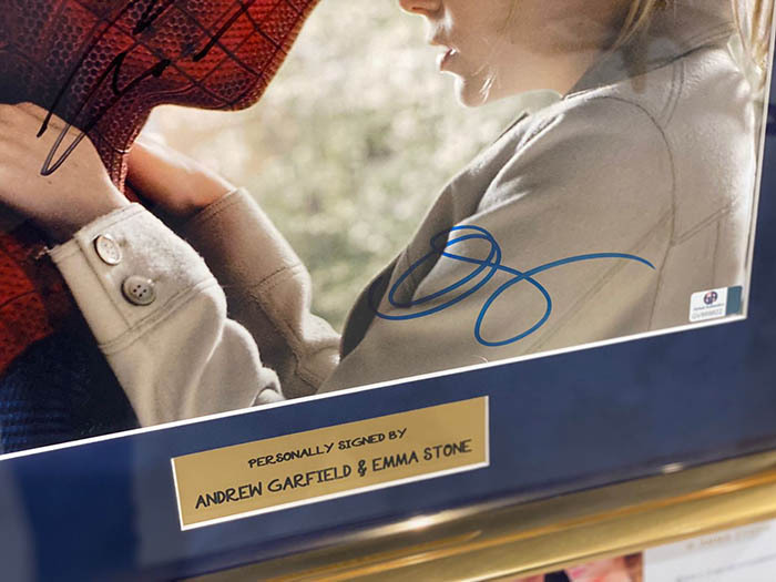 A photo from the movie "Spider-Man" with 2 autographs by actors Emma Stone and Andrew Garfield