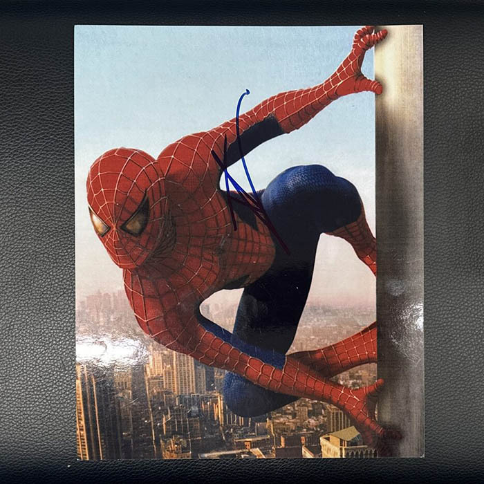 A photo from the movie "Spider-Man" signed by actor Tom Holland