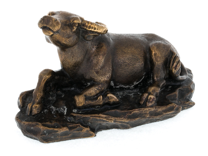 The statuette "The buffalo lying down"