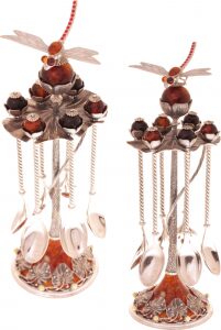 A set of tea spoons with amber "Dragonfly"