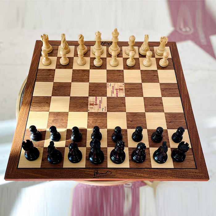 A chessboard with 2 autographs by Viswanathan Anand and Vladimir Kramnik