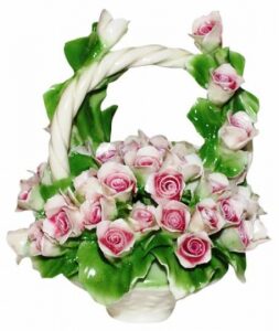 Decorative basket with a handle with pink roses