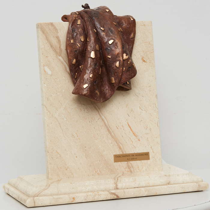 Bronze sculpture "Farciminis in Marmore " sausage on marble